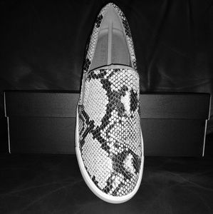 Marianne

Alabaster Snake Leather SNEAKERS